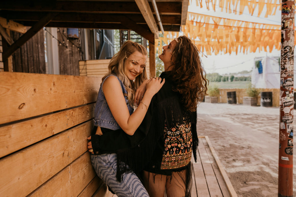 Two girls on a festival laughing